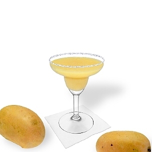 Mango Margarita im Margarita-Glas dekoriert mit einem Zucker- oder Salzrand. Klassiker!